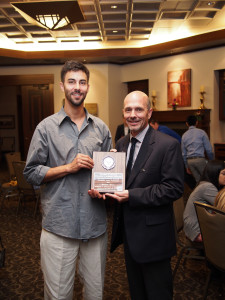 Matthew D'Anis receiving the 2014 Ivan D Rowland Memorial Outstanding Senior Scholarship presented by Gary DeGuire, Awards Chairman